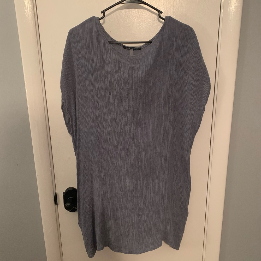 Light blue short dress with pockets.